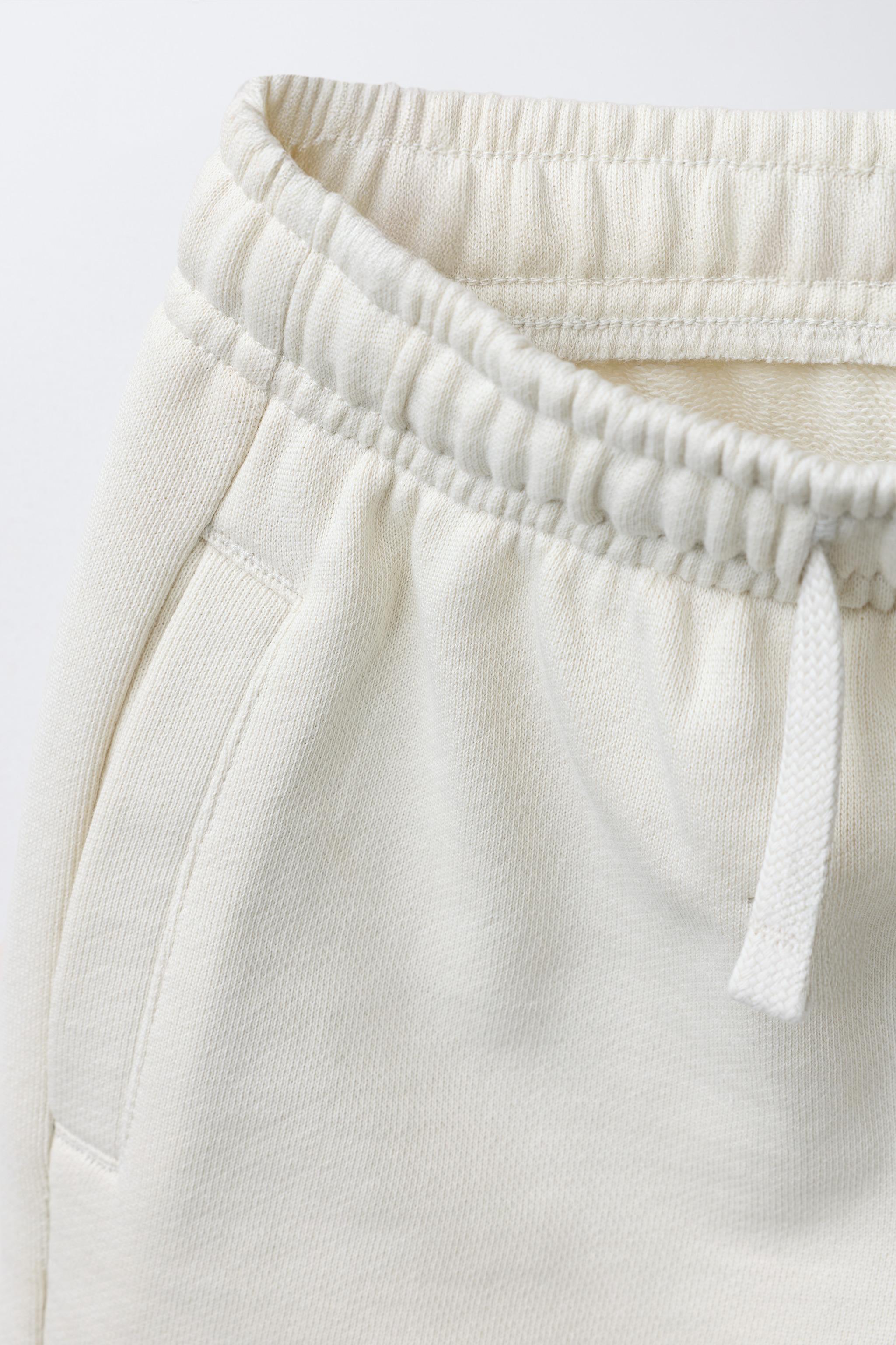 JOGGING SHORTS WITH LABEL